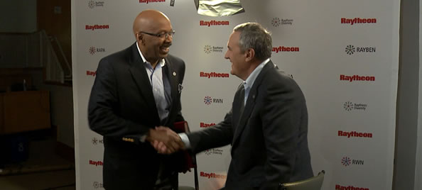 Photo: Chief Diversity Officer, Hayward Bell, sits with Chairman and CEO William H. Swanson